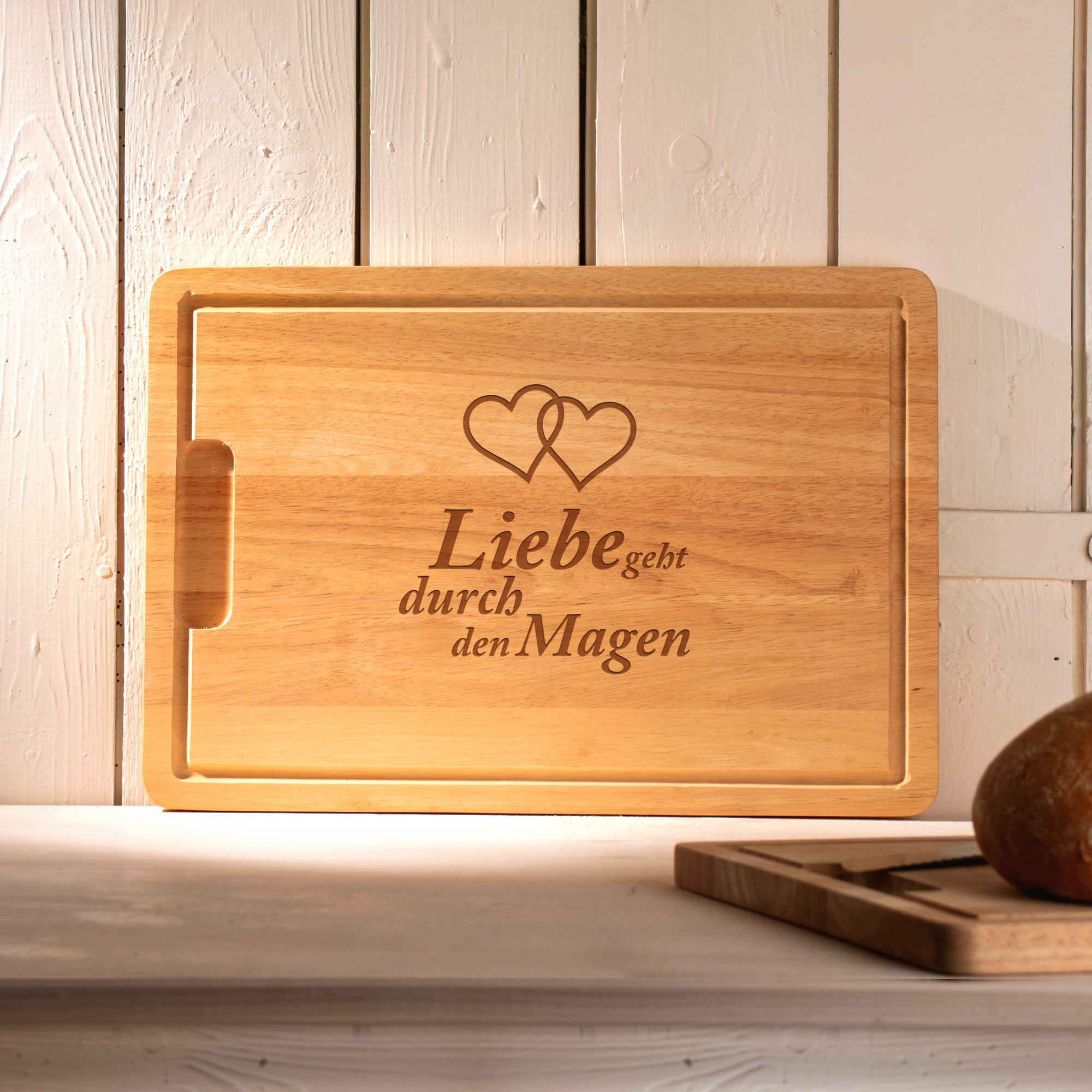 Holz Schneidebrett mit Gravur - Liebe geht durch den Magen